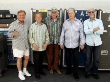 In this April 18, 2012, photo, The Beach Boys, from left, Bruce Johnston, Al Jardine, Mike Love, Brian Wilson and David Marks, pose for a portrait in Burbank, Calif. After decades of prolonged separations, legal spats and near reunions, the core Beach Boys are back together, both on stage and for an upcoming new album. (AP Photo/Matt Sayles)