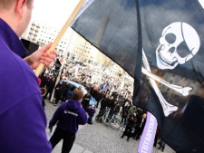 A supporter of file-sharing hub The Pirate Bay participates in a demonstration in Stockholm, Sweden on Saturday, April 18 2009. (AP Photo/Scanpix Sweden, Fredrik Persson)