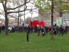 Protesters begin to arrive at Alexandra Park in Toronto on Tuesday, May 1, 2012. 