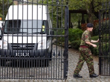 British army personnel leave residential apartments in Bow, east London, on Tuesday, May 1, 2012. The Ministry to Defense plans to place surface-to-air missiles atop the apartment block during the Summer Olympics. (AP Photo/Lefteris Pitarakis)