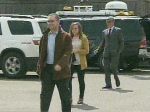 Toronto Star Reporter Daniel Dale (left) walks into 22 Division Thursday afternoon. (CP24)