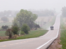 A truck travels along Highway 14, several miles north of Neligh, Neb., Thursday, April 19, 2012, near the proposed new route for the Keystone XL pipeline. (AP Photo/Nati Harnik)