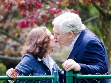 Conrad Black, right, kisses his wife Barbra Amiel Black as he arrives at his Bridle Path residence in Toronto on Friday, May 4, 2012. Black was released from a Florida State prison after serving his sentence. THE CANADIAN PRESS/Nathan Denette