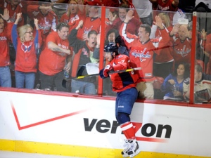 Washington Capitals defenseman Mike Green (52) celebrates his goal against the New York Rangers during the third period of Game 4 of an NHL hockey Stanley Cup second-round playoff series, Saturday, May 5, 2012, in Washington. The Capitals won 3-2. (AP Photo/Nick Wass)