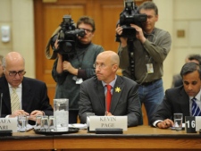 Kevin Page, Parliamentary budget officer, middle, appears at Commons finance committee on Parliament Hill in Ottawa on Thursday, April 26, 2012. THE CANADIAN PRESS/Sean Kilpatrick