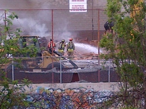 Firefighters battle a blaze at a factory on Progress Avenue in Scarborough on Monday, may 7, 2012. 