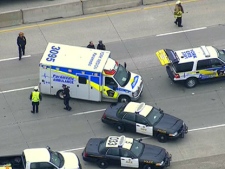 Emergency vehicles are pictured following a crash on Highway 407 near Yonge Street on Monday, May 7, 2012.
