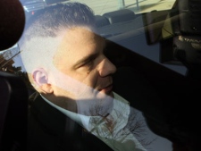 Michael Rafferty is transported from the courthouse in the back of police cruiser in London, Ont., on Wednesday, March, 14, 2012. (THE CANADIAN PRESS/Dave Chidley)
