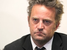 Actor Matthew Perry is seen in a file photo. The former "Friends," star will star in a Tuesday night comedy on NBC as a fast-talking, sarcastic sportscaster who loses his wife in a car accident. (AP Photo/Haraz N. Ghanbari)