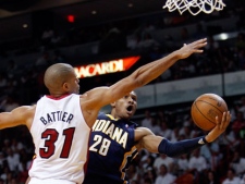 Indiana Pacers guard Leandro Barbosa (28) shoots against Miami Heat forward Shane Battier (31) during the first half of Game 1 in an NBA basketball Eastern Conference semifinal playoff series, Sunday, April 13, 2012, in Miami. (AP Photo/Wilfredo Lee)