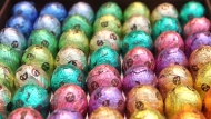 A selection of different flavoured chocolate eggs are displayed for Easter at a chocolate shop in Brussels in this 2012 file photo. (AP / Yves Logghe)