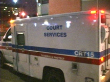 Kyle Weese is transported from Toronto police 55 Division to court early Wednesday, Oct. 29, 2008.