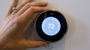 A thermostat can be seen above. (AP Photo/Eric Risberg)