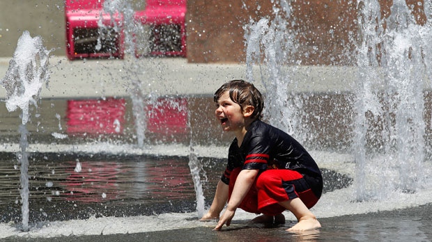 Boy at fountain