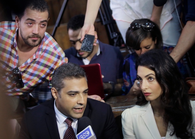 Mohammed Fahmy and Amal Clooney 
