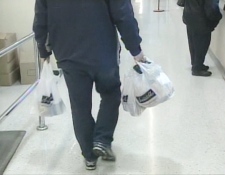 Shoppers could soon be forced to pay 5 cents per plastic bag taken from grocery stores.