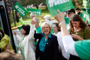 Green Party leader Elizabeth May, arrives by bus during a campaign rally to speak to supporters during the final stop of her three-day Vancouver Island bus tour in Victoria, B.C., Sunday, October 18, 2015. THE CANADIAN PRESS/Chad Hipolito