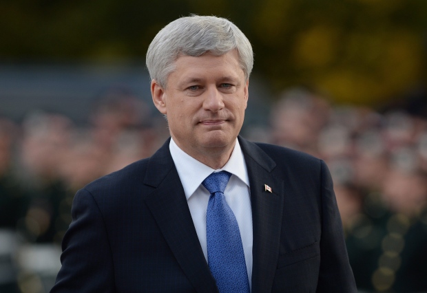 Prime Minister Stephen Harper arrives at a ceremony marking the one year anniversary of the attack on Parliament hill Thursday Oct. 22, 2015 at the National War Memorial in Ottawa. THE CANADIAN PRESS/Sean Kilpatrick