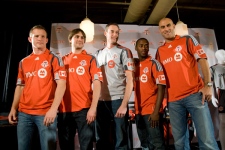 Toronto FC players (from left) Chad Barrett, Todd Dunivant, Greg Sutton, Rohan Ricketts and Danny Dichio show off Toronto FC's new 2009 jerseys on Thursday, Dec. 4, 2008. (CP24/Maurice Cacho)