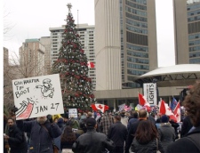 About 500 people attended the rally held outside City Hall at Nathan Phillips Square.