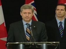 Prime Minister Stephen Harper, joined by Ontario Premier Dalton McGuinty, announce a Canadian bailout for the auto industry from Ottawa on Saturday, Dec. 20, 2008.