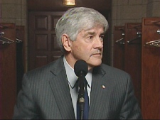 Foreign Affairs Minister Lawrence Cannon speaks with reporters in Ottawa, Wednesday, Jan. 7, 2008.