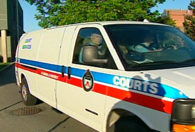 A Toronto police Court Services van leaves 31 Division on Monday, May 28, 2007.
