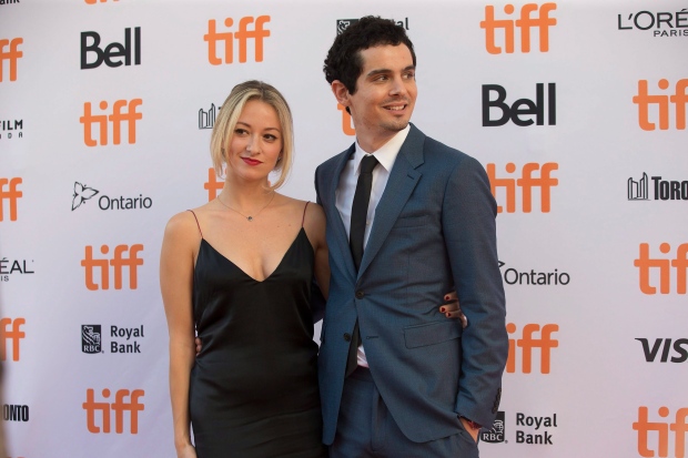 Director Damien Chazelle and Olivia Hamilton arrive on the red carpet for the film 'La La Land' during the 2016 Toronto International Film Festival in Toronto on Monday, Sept. 12, 2016. THE CANADIAN PRESS/Chris Young