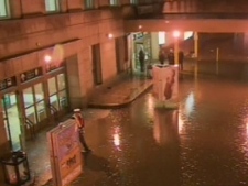 Water is seen flooding the area out side Union Station in Toronto on Wednesday evening, Feb. 11, 2009.