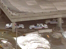 An aerial view of Wilson subway station and Toronto Police Service cruisers gathered after the reported stabbing on Thursday, Feb. 12, 2009.