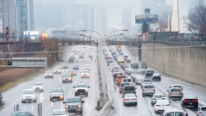 Vehicles makes their way into and out of downtown Toronto along the Gardiner Expressway in Toronto on Thursday, November 24, 2016. THE CANADIAN PRESS/Nathan Denette