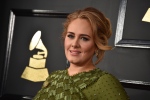 In this Feb. 12, 2017, file photo, Adele arrives at the 59th annual Grammy Awards at the Staples Center in Los Angeles. Photo by Jordan Strauss/Invision/AP, File)
