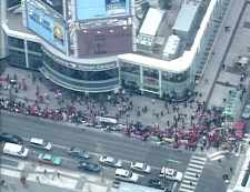 Thousands of Toronto Tamils lined up outside the Eaton Centre to protest the civil war in Sri Lanka. The local Tamils are planning on forming a human chain through the city's core.