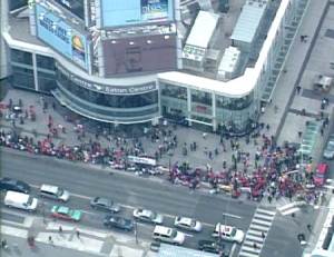 Thousands of Toronto Tamils lined up outside the Eaton Centre to protest the civil war in Sri Lanka. The local Tamils are planning on forming a human chain through the city's core.