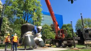 British modern artist Henry Moore's civic icon, 'Large Two Forms,' was relocated to its new home in a revitalized Grange Park ahead of the reopening in July. (Art Gallery of Ontario)