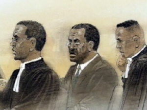 Johnson Aziga and his defence team are shown in this undated courtroom sketch.