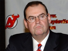 This file photo shows Pat Burns during his tenure as coach of the New Jersey Devils. (AP / Bill Kostroun)