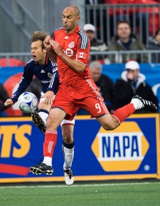 Toronto FC forward Danny Dichio, right, battles for the ball against Chivas USA Carey Talley, left, during first half MLS soccer action in Toronto on Wednesday, April 22, 2009. (THE CANADIAN PRESS/Nathan Denette)