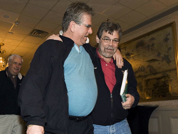 CAW President Ken Lewenza, left, and Local 444 President Rick LaPorte, leave a press conference regarding negotiations with Chrysler Canada in Toronto on Friday, April 24, 2009 (THE CANADIAN PRESS / Nathan Denette)