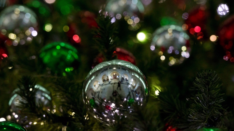 Christmas decorations adorn a tree in Ottawa in a Dec.14, 2014 file photo. (Adrian Wyld/THE CANADIAN PRESS)