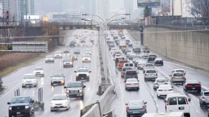 Vehicles makes there way into and out of downtown Toronto along the Gardiner Expressway in Toronto on Thursday, November 24, 2016. (THE CANADIAN PRESS/Nathan Denette)