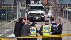 Police are seen near a damaged van in Toronto after a van mounted a sidewalk crashing into a number of pedestrians on Monday, April 23, 2018. The victims of a deadly van attack in northern Toronto have a wider range of options for recourse to deal with the fallout because it involved a motor vehicle under the province's insurance system, lawyers say. THE CANADIAN PRESS/Aaron Vincent Elkaim