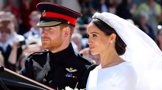 Britain's Prince Harry and his wife Meghan Markle 