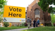 People line up to vote at a west-end Toronto church on Thursday, June 7, 2018. THE CANADIAN PRESS/Graeme Roy