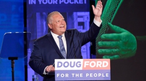 Ontario PC leader Doug Ford looks up while giving a tribute to his late brother Rob as he reacts after winning the Ontario Provincial election to become the new premier in Toronto, on Thursday, June 7, 2018. THE CANADIAN PRESS/Nathan Denette