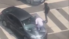 Man stomps on car