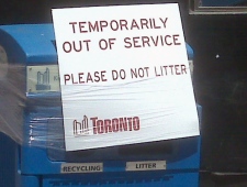 A sign prevents people from throwing out their garbage or recycling on Monday June 22, 2009. (CP24/Brian Carr)