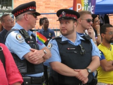 Toronto police officers chat during the Police Services Board Pride Reception on Friday, June 19, 2009. (CP24/Saira Peesker)<br><br>
