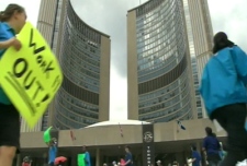 Striking CUPE members make their voices heard outside City Hall in downtown Toronto.