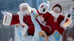 Santa and Mrs. Claus wave to spectators in this undated file photo. (AP)